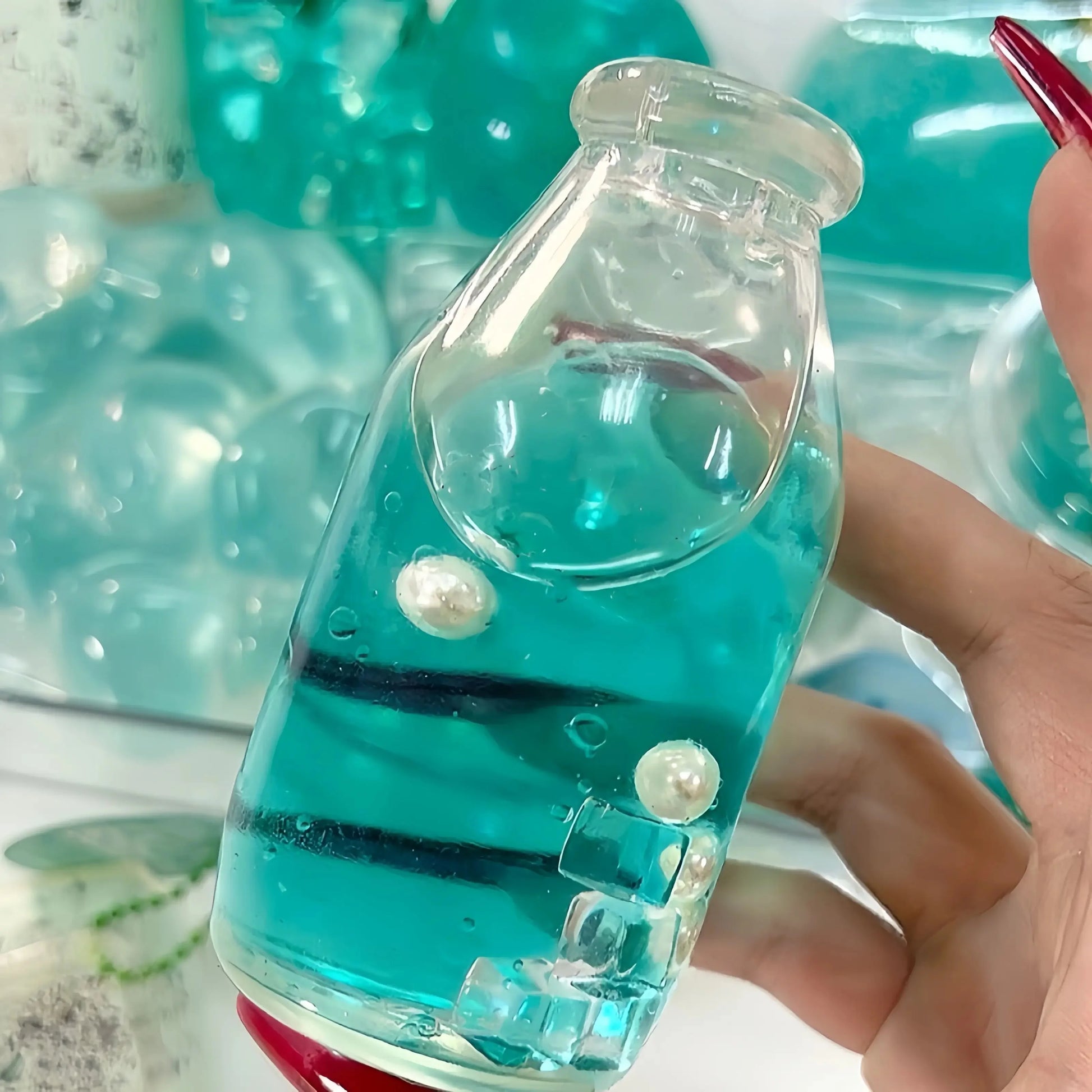 DumplingSquishys clear bottle squishy – Layered Mint Sparkle Bottle