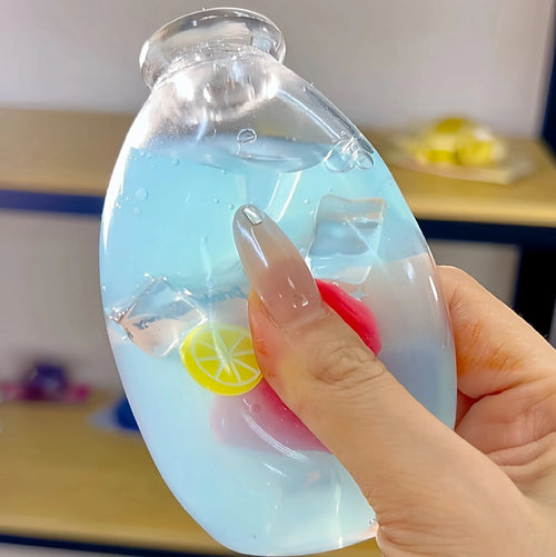 DumplingSquishys Bottle Pop Squishy – Jumbo Juice Bottle Stress Relief Toy – Sea Salt Strawberry Sparkling Water