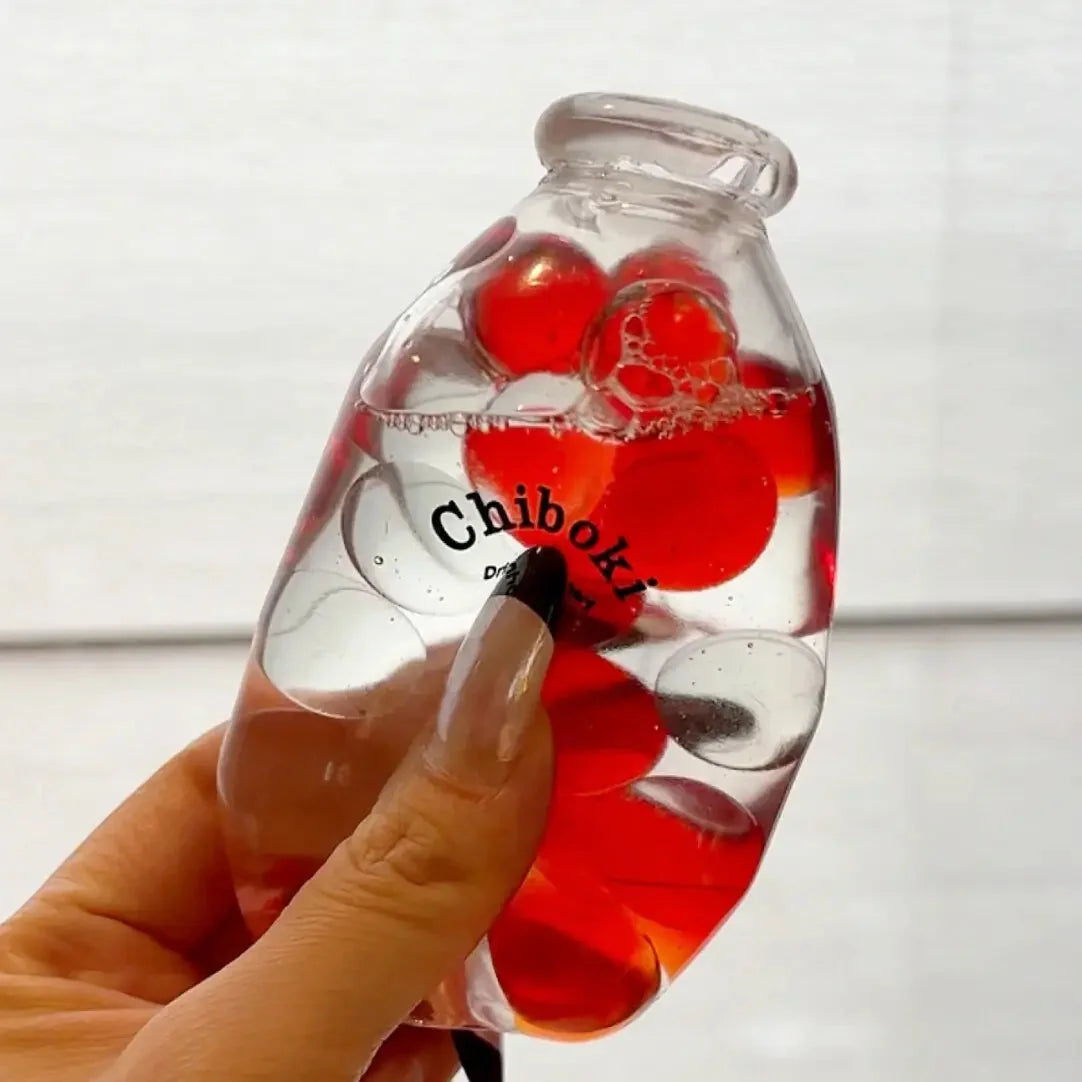DumplingSquishys Bottle Pop Squishy – Mini Bead Bottle Stress Relief Toy – Red Wine Pinball Squishy Bottle