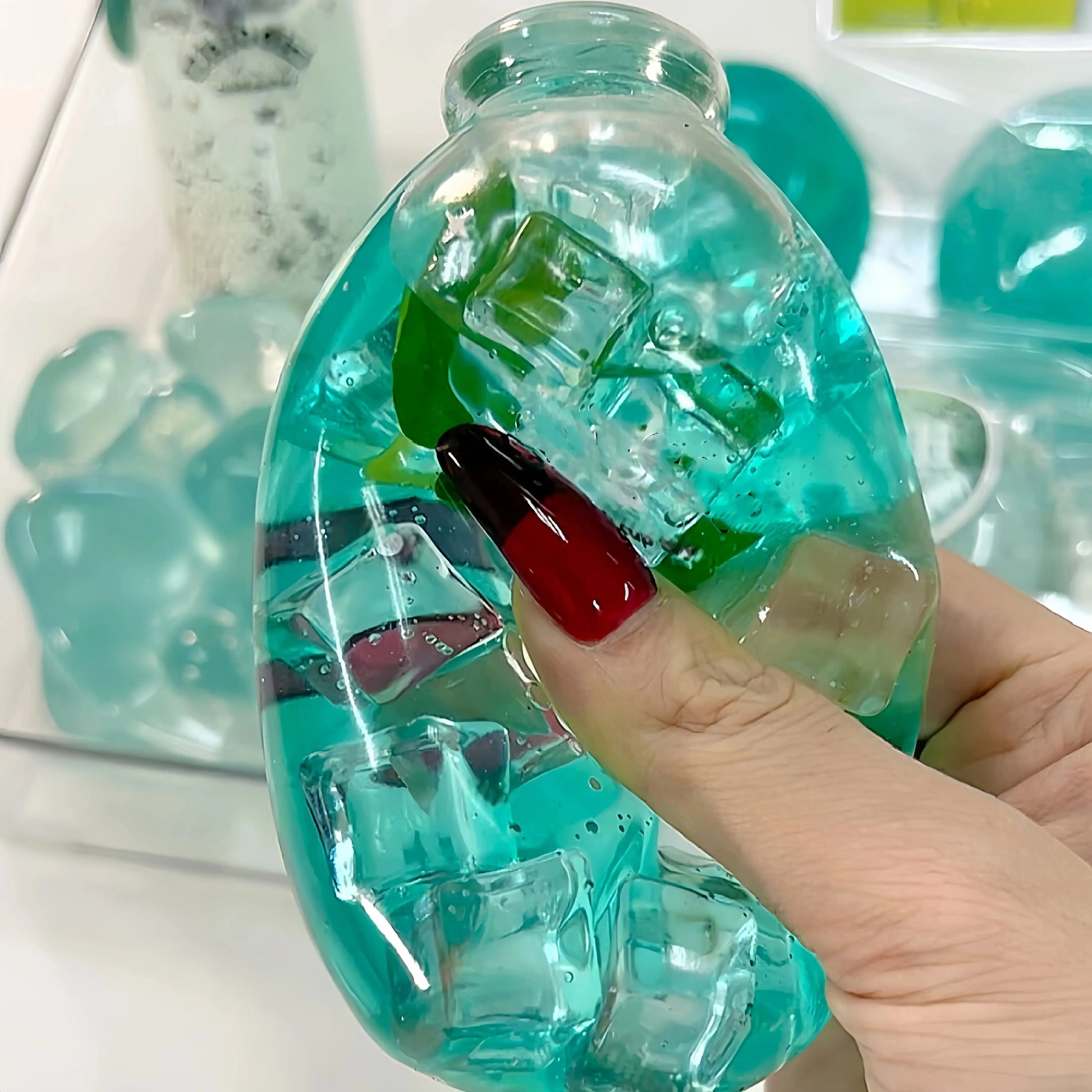 DumplingSquishys clear bottle squishy – Minty Ice Tea Bottle