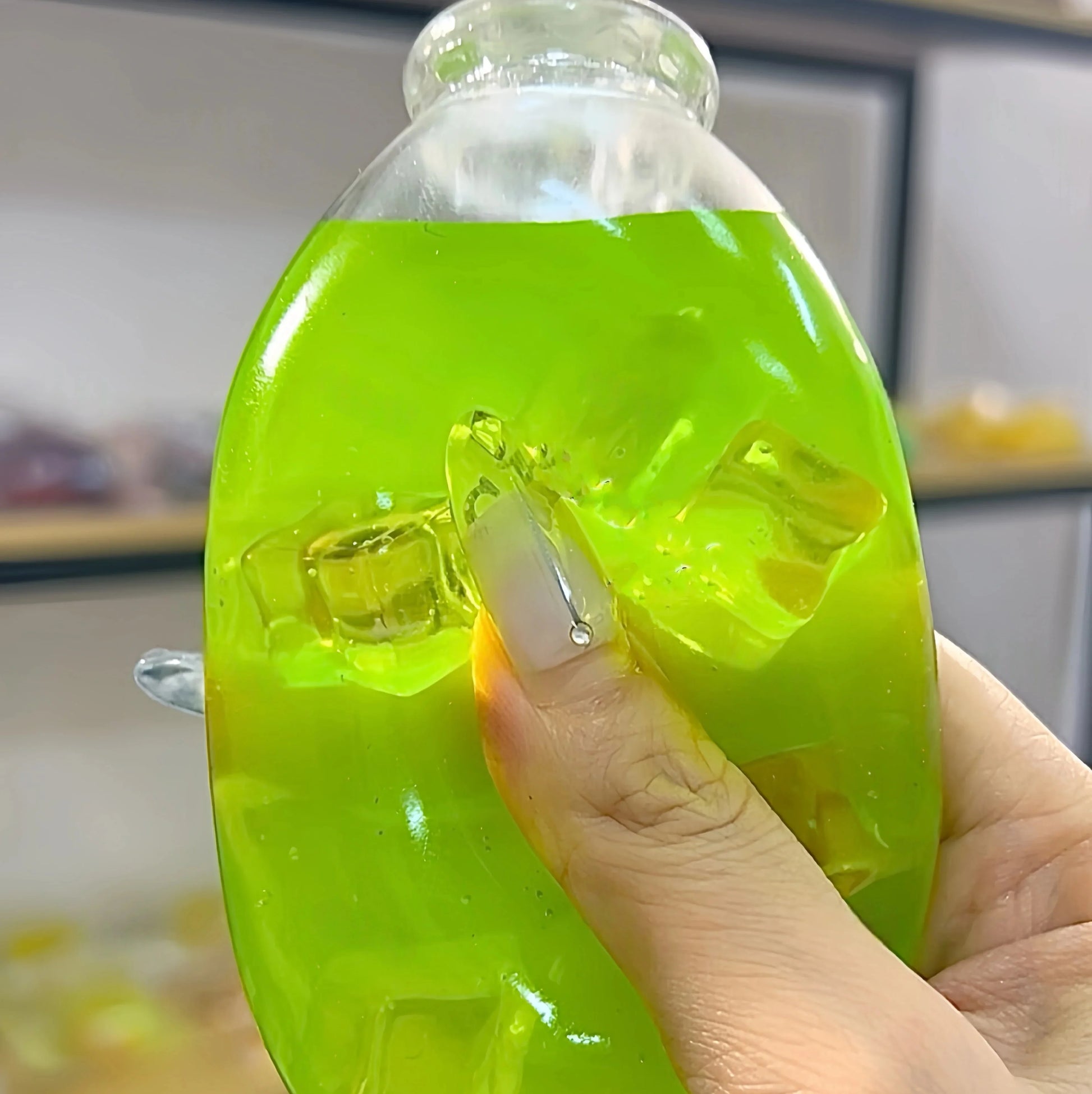 DumplingSquishys Bottle Pop Squishy – Jumbo Juice Bottle Stress Relief Toy – Green Apple Bottle