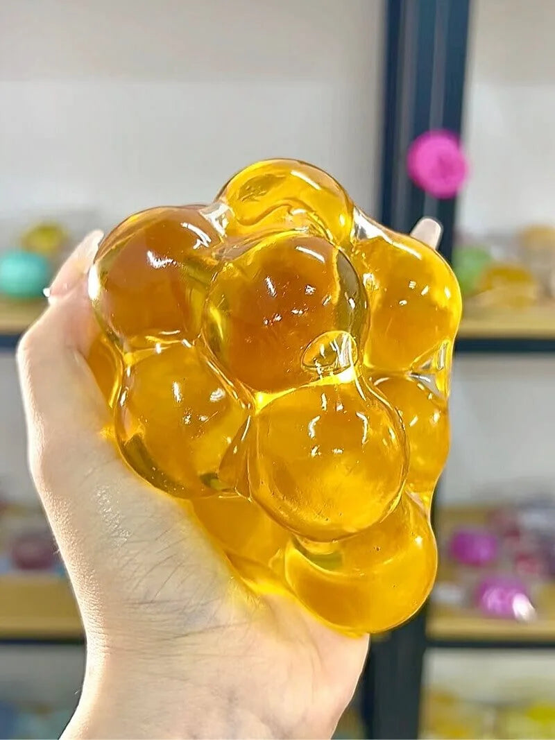 DumplingSquishys Gem Ball Squishy – Jumbo Grape Bead Stress Relief Toy – Yellow Crystal Ball Mega Edition