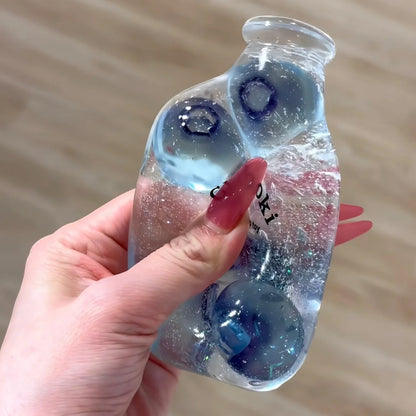 DumplingSquishys Bottle Pop Squishy – Mini Juice Bottle Stress Relief Toy – material detail view