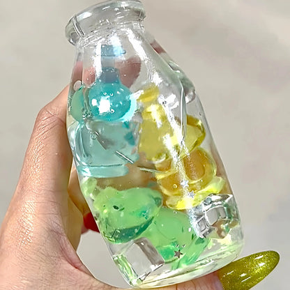 DumplingSquishys Bottle Pop Squishy – Clear Bead Bottle Stress Relief Toy – Sunshine Bath Bottle