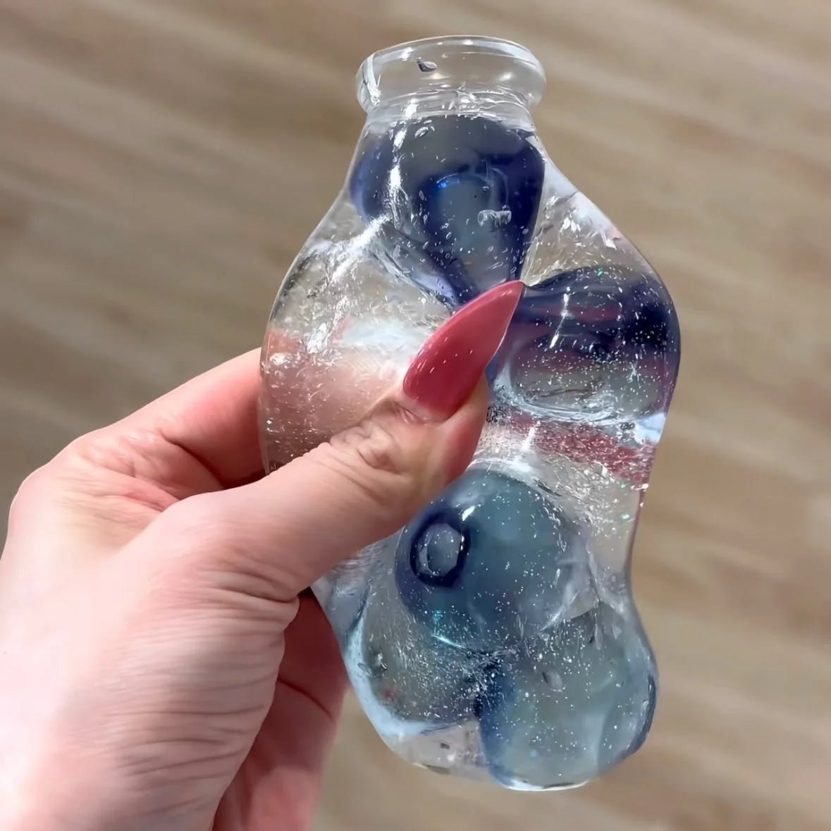 DumplingSquishys Bottle Pop Squishy – Mini Juice Bottle Stress Relief Toy – alternate angle