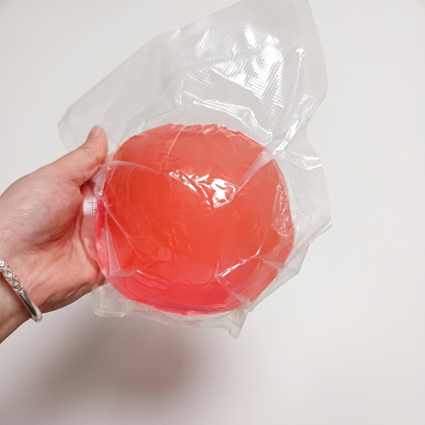 DumplingSquishys coral red coconut oil soap base squishy