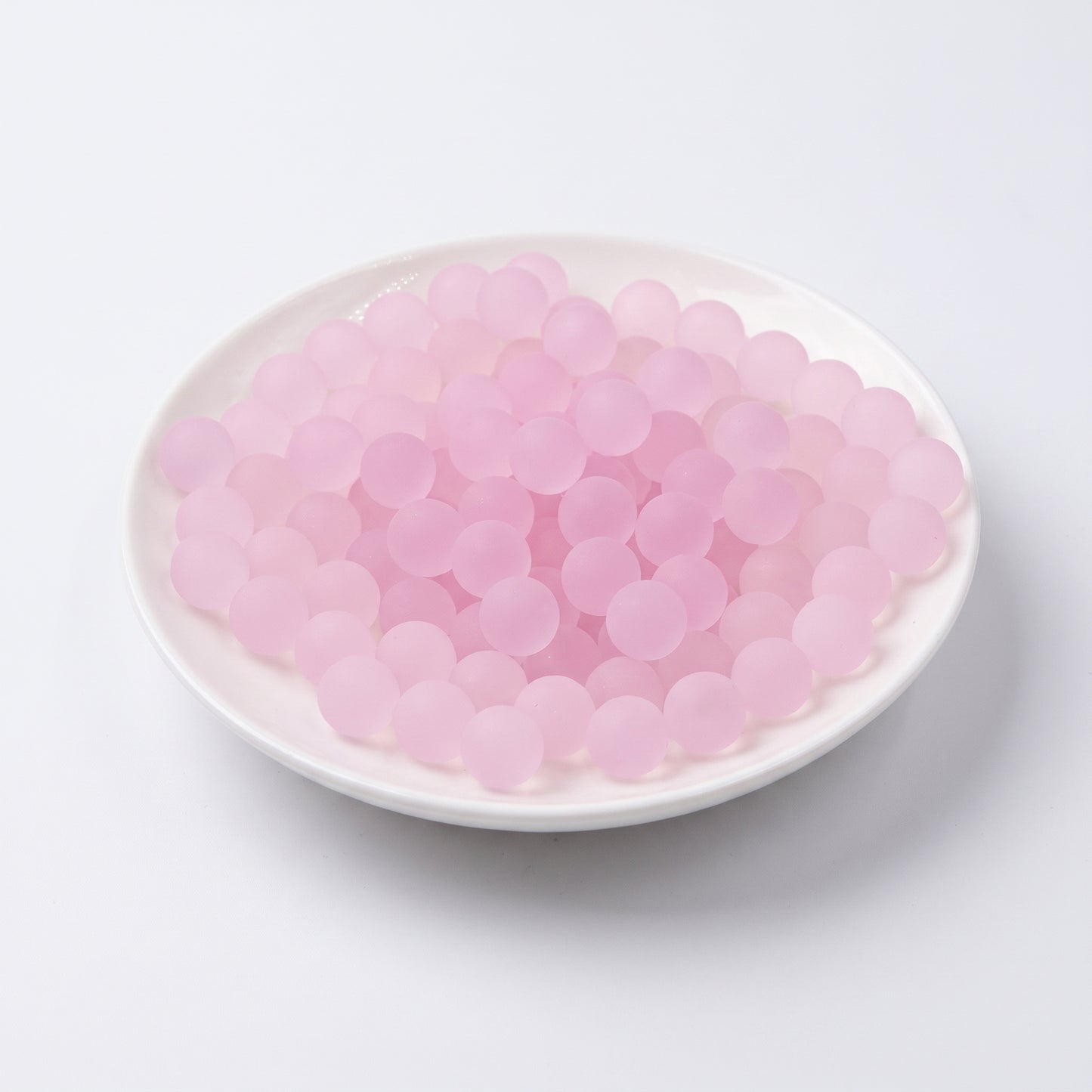 DumplingSquishys blush pink frosted jelly ball fidget toy