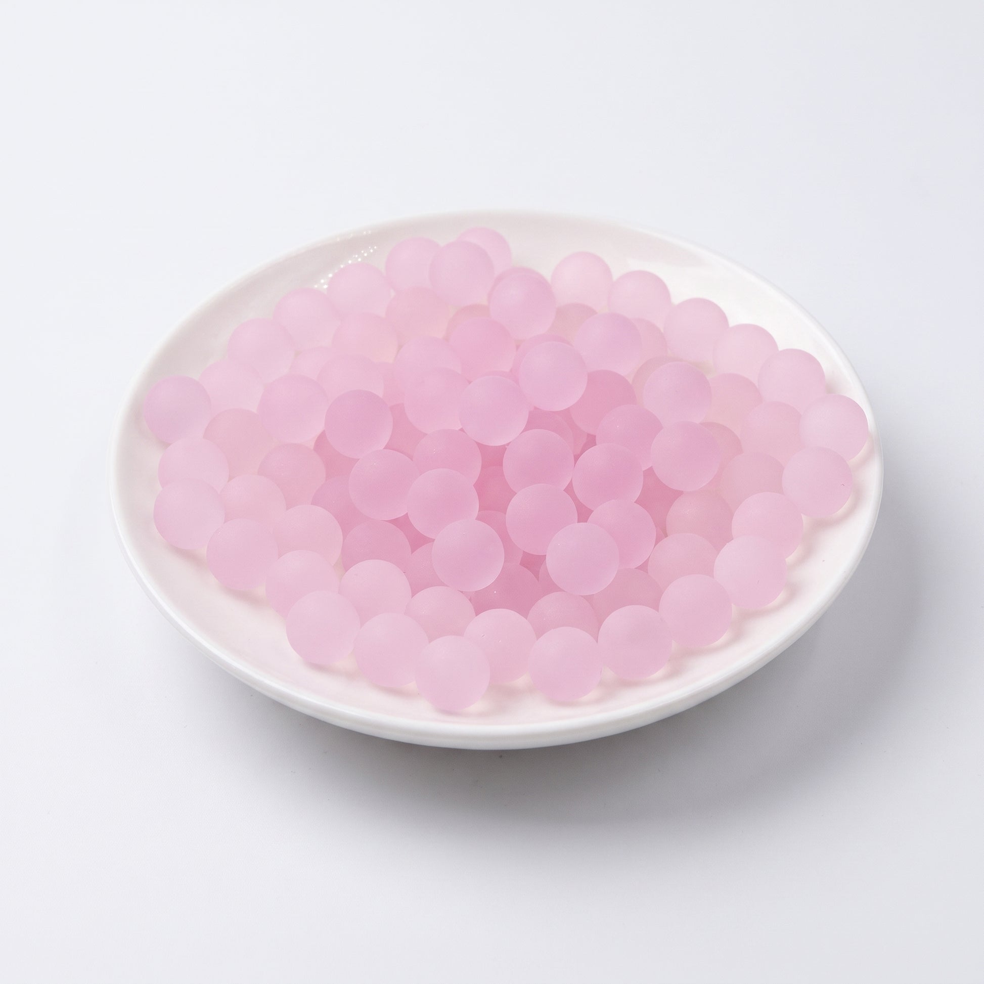 DumplingSquishys blush pink frosted jelly ball fidget toy