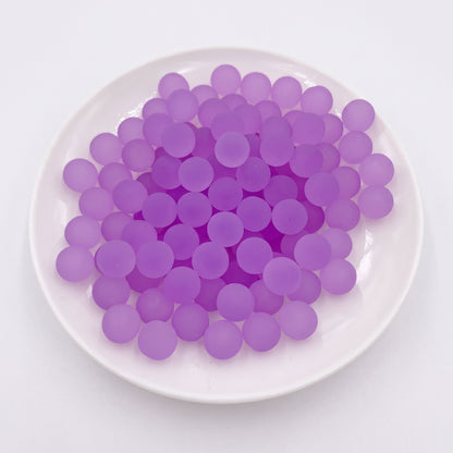 DumplingSquishys purple frosted jelly ball fidget toy